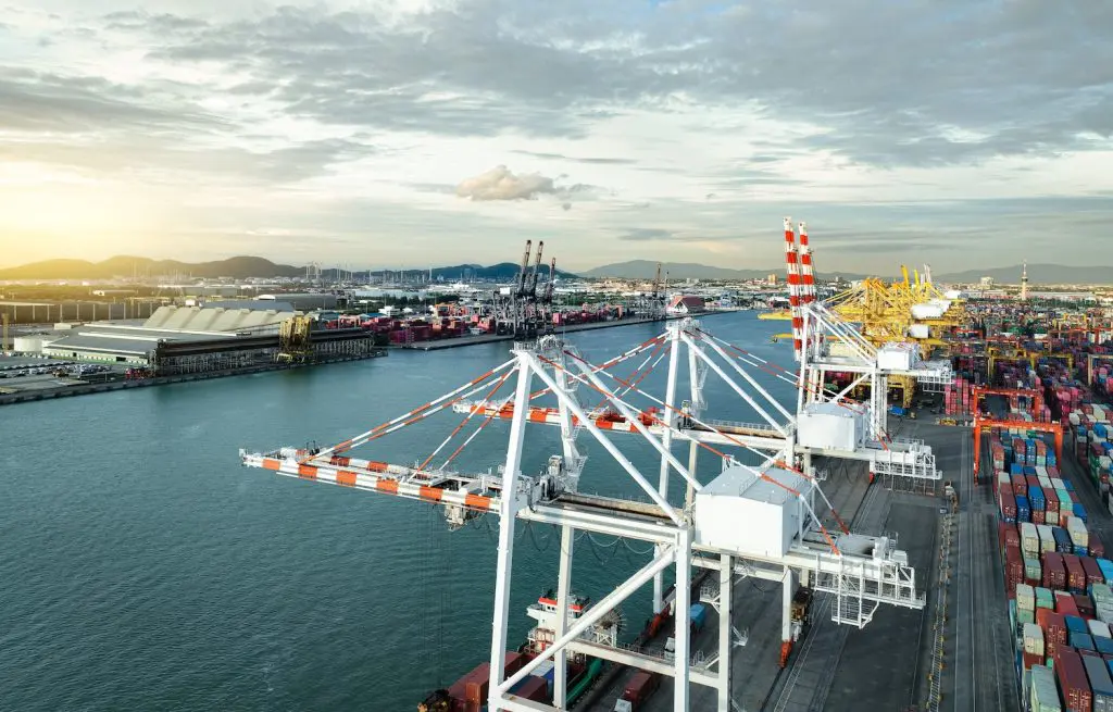 Logistics and transportation of containers at a port that are bound for the Philippines. The businesses sending these containers have researched how to export from the UK to the Philippines.